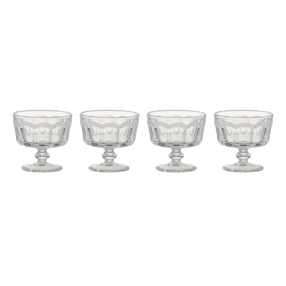 Set of four clear glass dessert bowls with decorative bases on a white background
