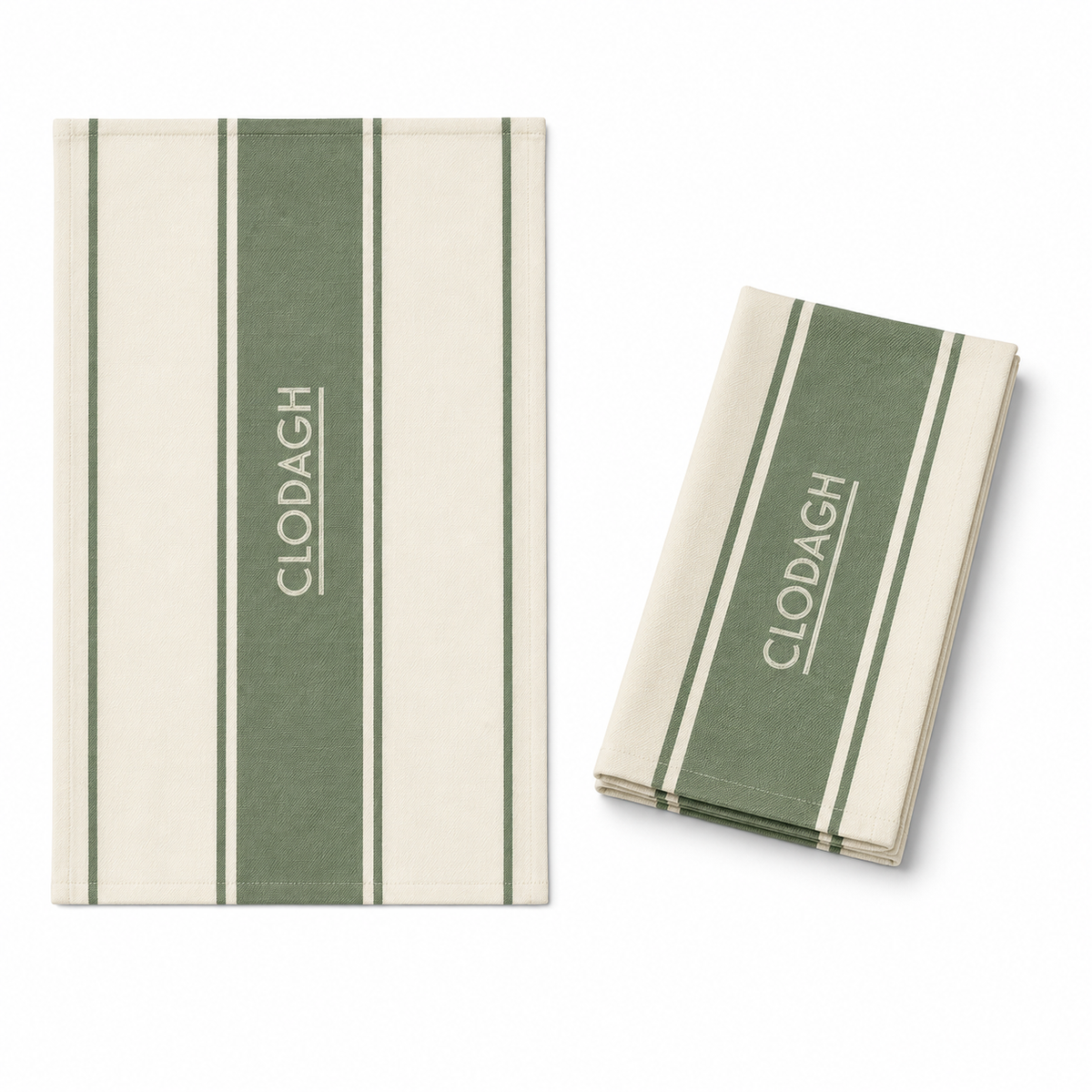 Two striped cloth napkins with vertical sage green and cream stripes, one flat and one folded, both printed with the brand name 'CLODAGH'.