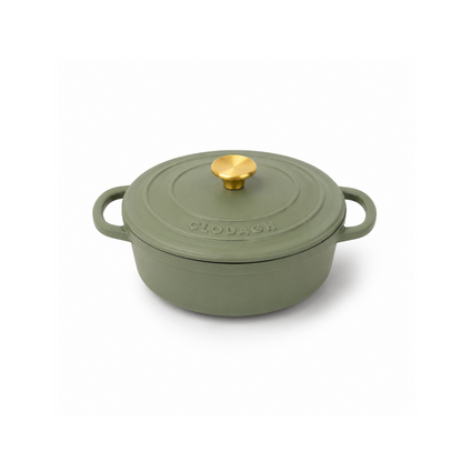 An olive green enameled cast iron pot with a matching lid and a gold-colored knob, shown on a clean white background.