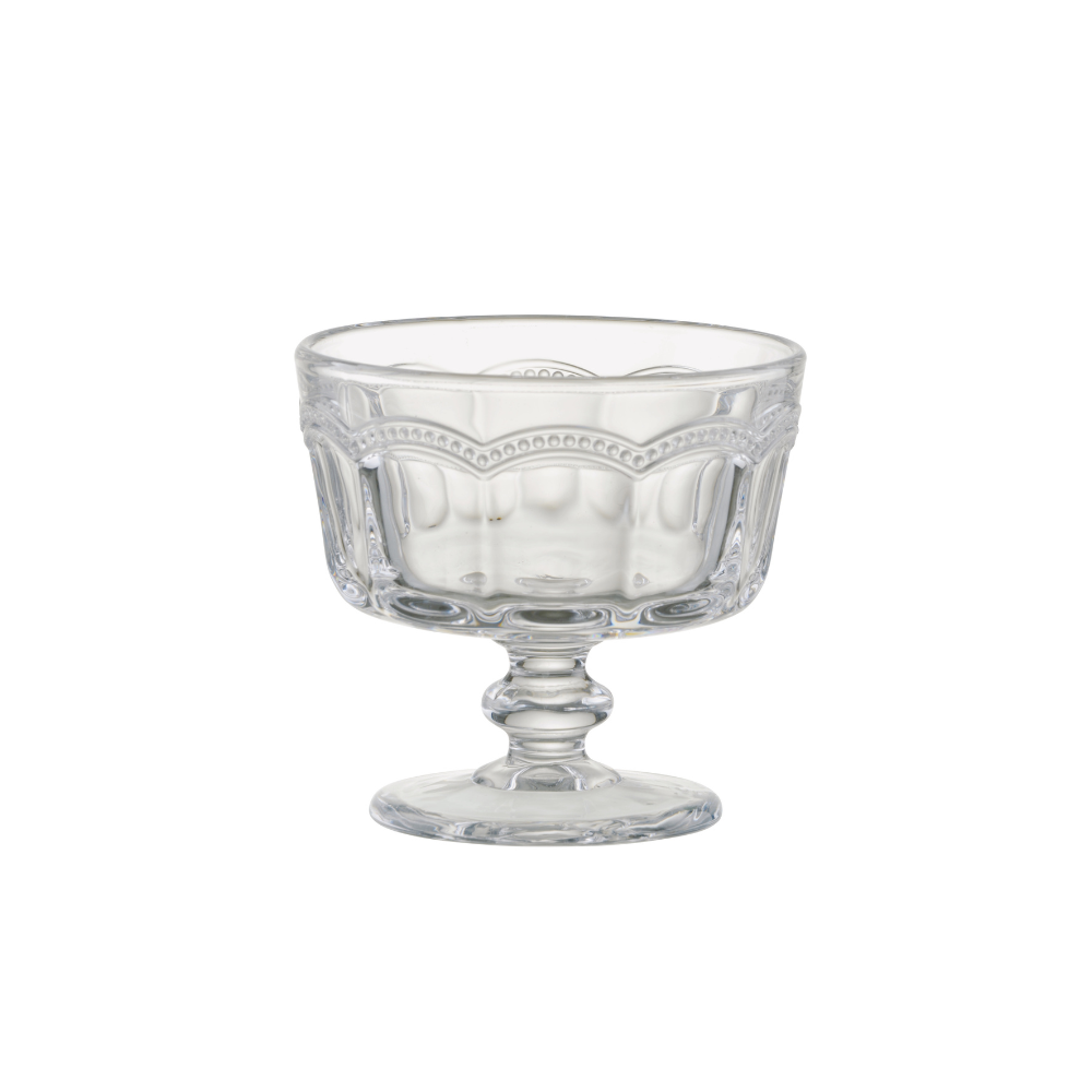 Clear glass footed bowl on a white background