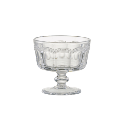 Clear glass footed bowl on a white background
